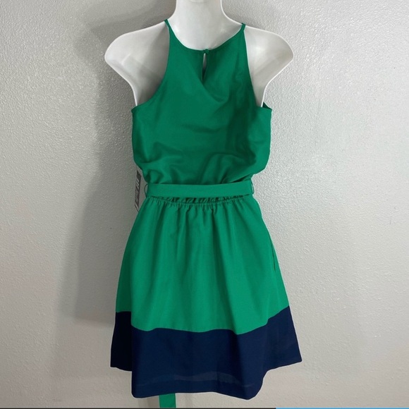 Donated to Women in Distress
Express Green halter dress with blue trim - Picture 3 of 4